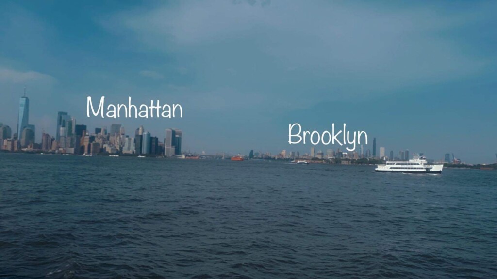 The Enchanting Manhattan Skyline: A Captivating View with the Statue of Liberty